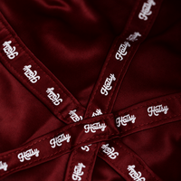 Close-up of the HATSY silk lining in burgundy